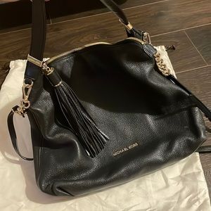 MK crossbody bag with tassel